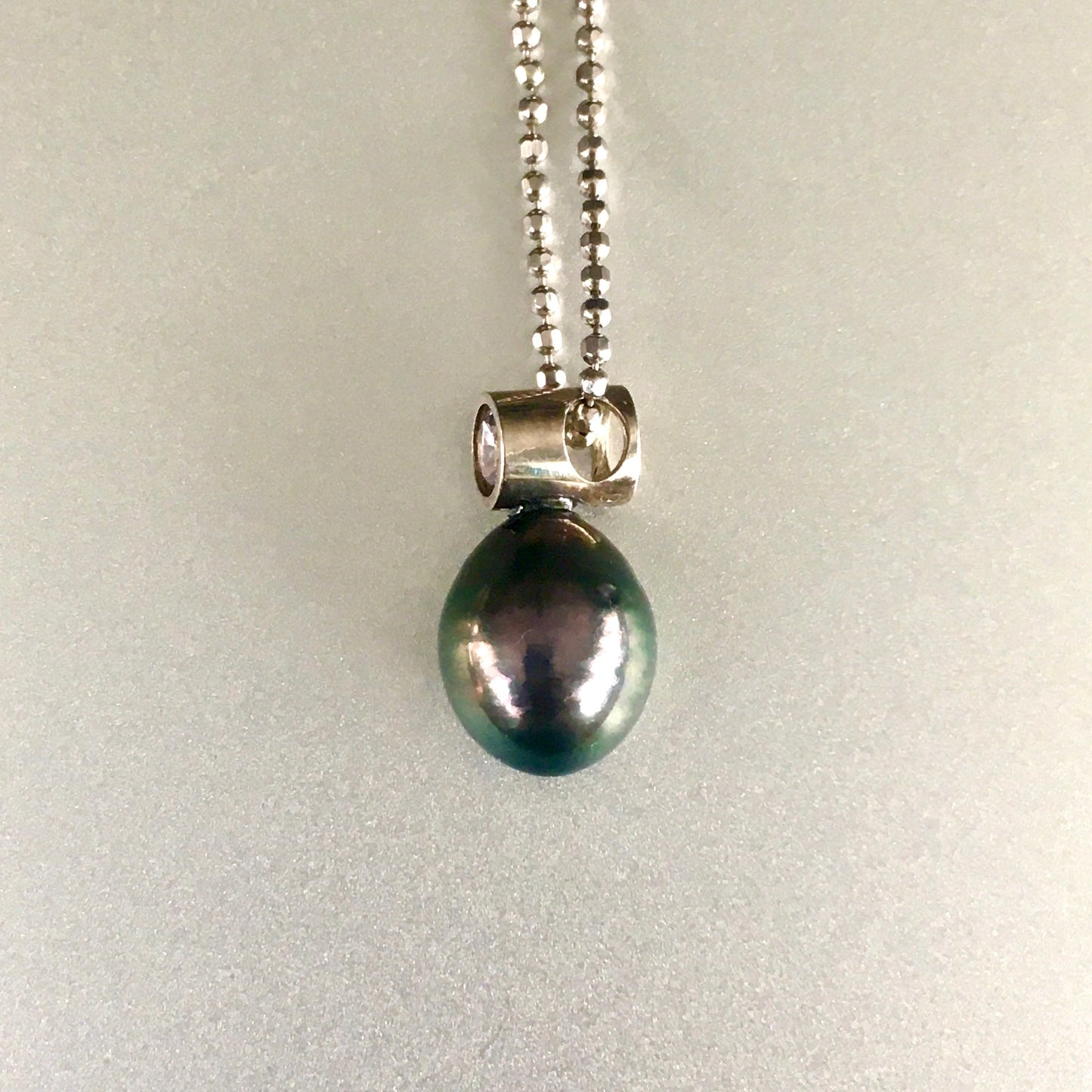 .91 Purple Sapphire and Pearl Pendant